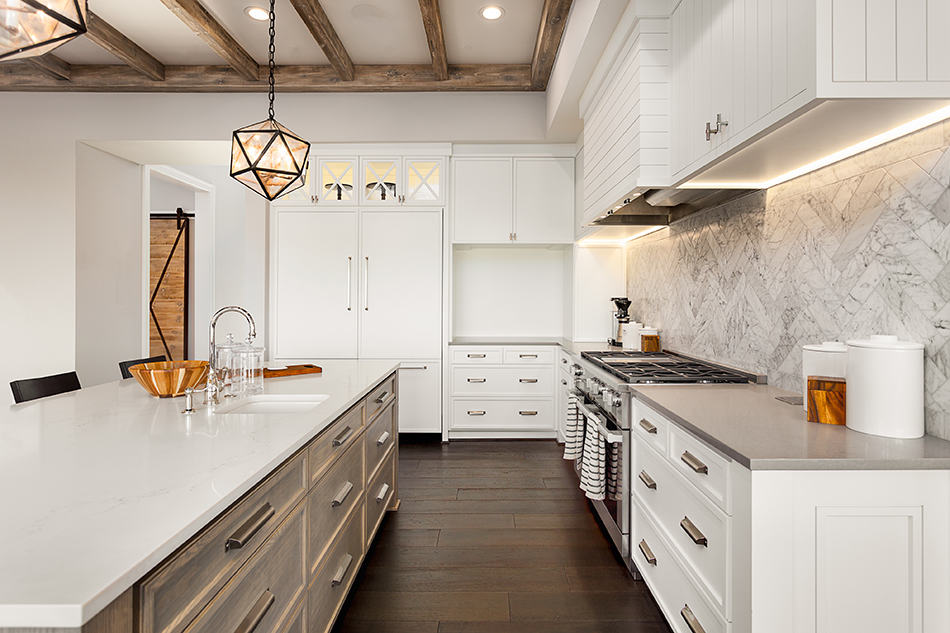 Pair white cabinets with white walls and pale accessories