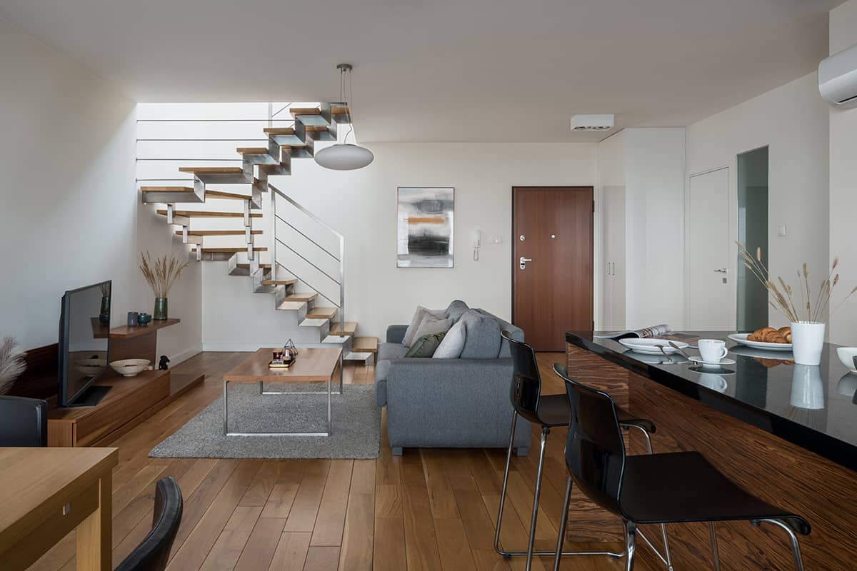 Freestanding Staircase in Open Plan Apartment