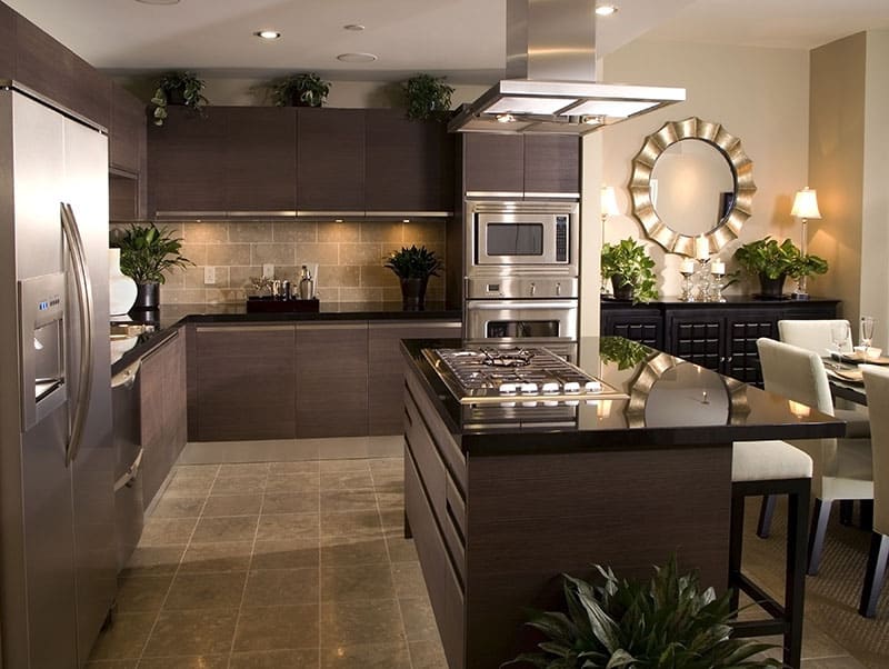 Rectangular Dark Brown Island In A Warm And Inviting Kitchen