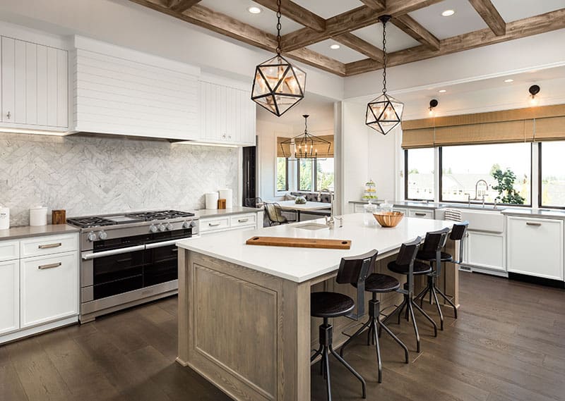 Simple Island Blends In With Hardwood Tile And Timber Tamed Ceiling