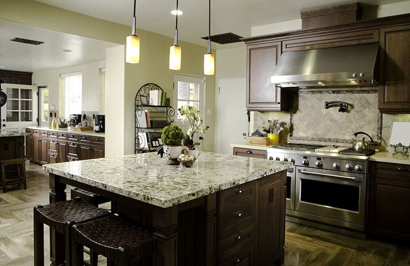 Square Island In An Open Ended Kitchen Seeing The Living Room Dining Room Bathroom