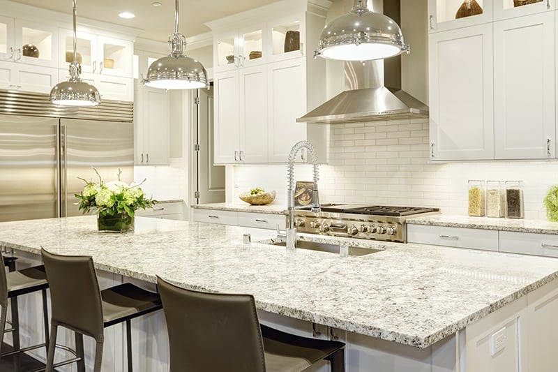 Modern White Kitchen Cabinets With Light Granite Countertops for Large Space