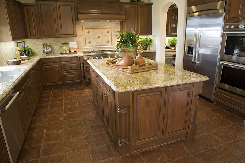 Light Brown Kitchen Design With Tile Matching The Brown Wood Of The Island And Cabinetry
