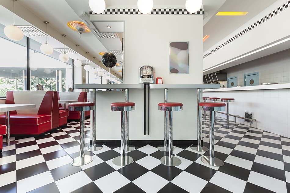 Bar Stools in an American diner restaurant on a checkerboard floor