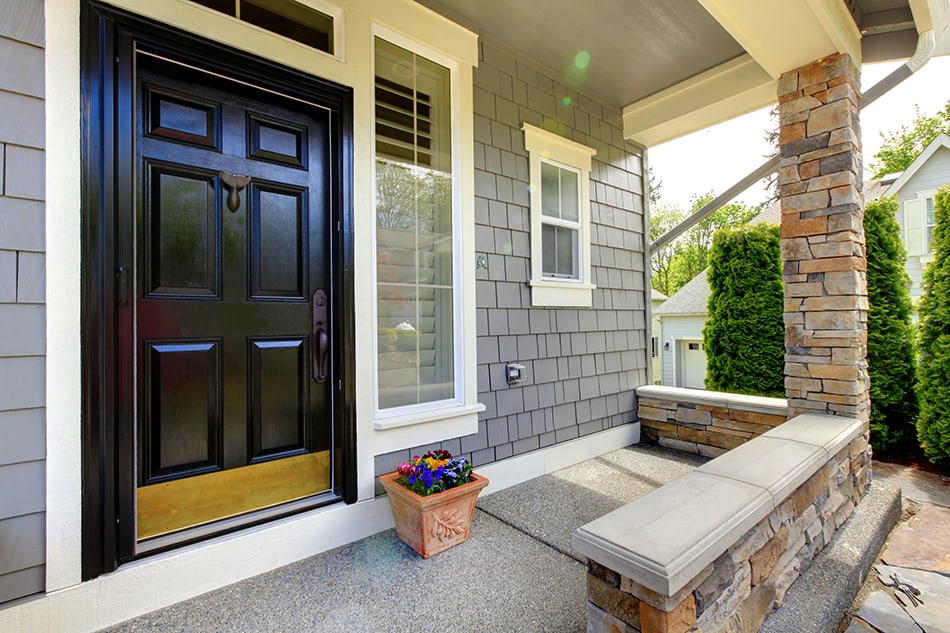 Black door with a grey exterior