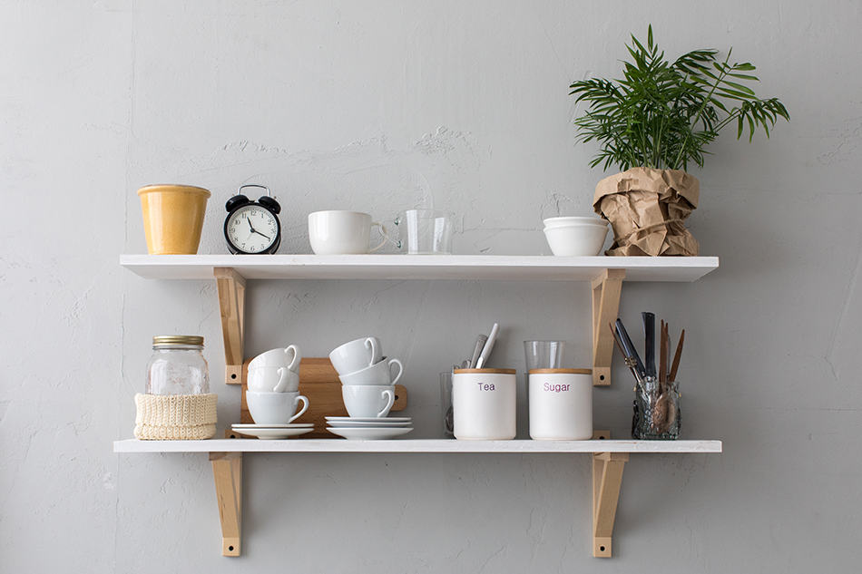 Fill up wall shelves with utensils