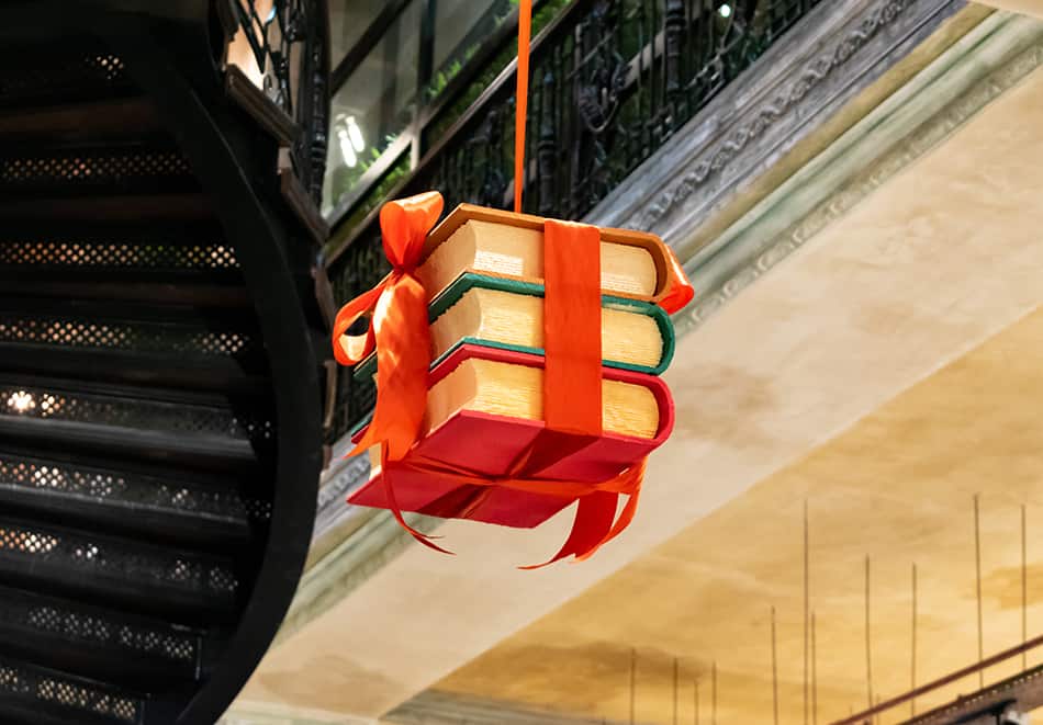 Hang gift books from the ceiling