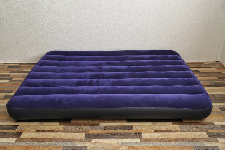 inflatable mattress on top of mattress