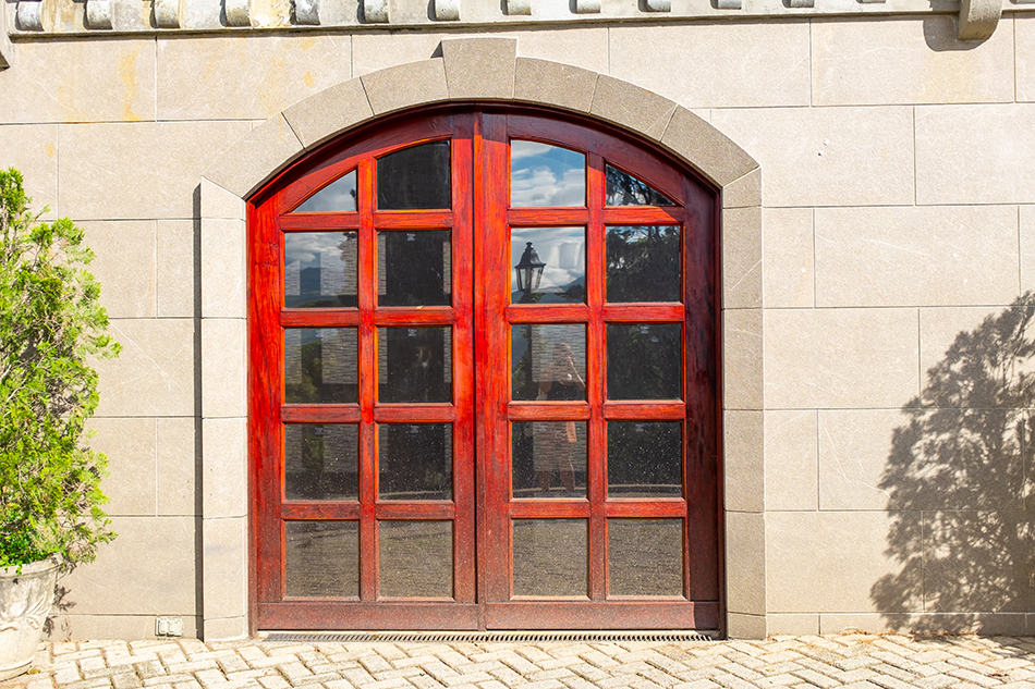 Dash of Red on Double Glass Doors