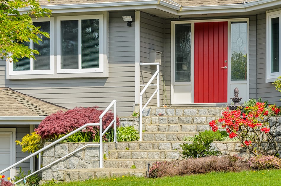 Red Wooden Door with Grey and White exteriors