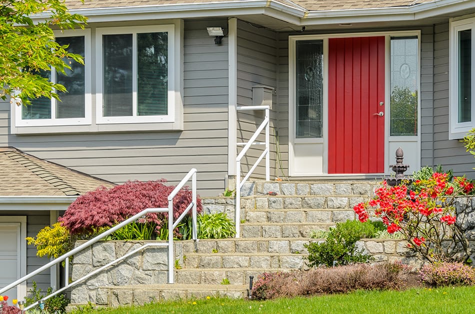 Red Wooden Door with Grey and White exteriors