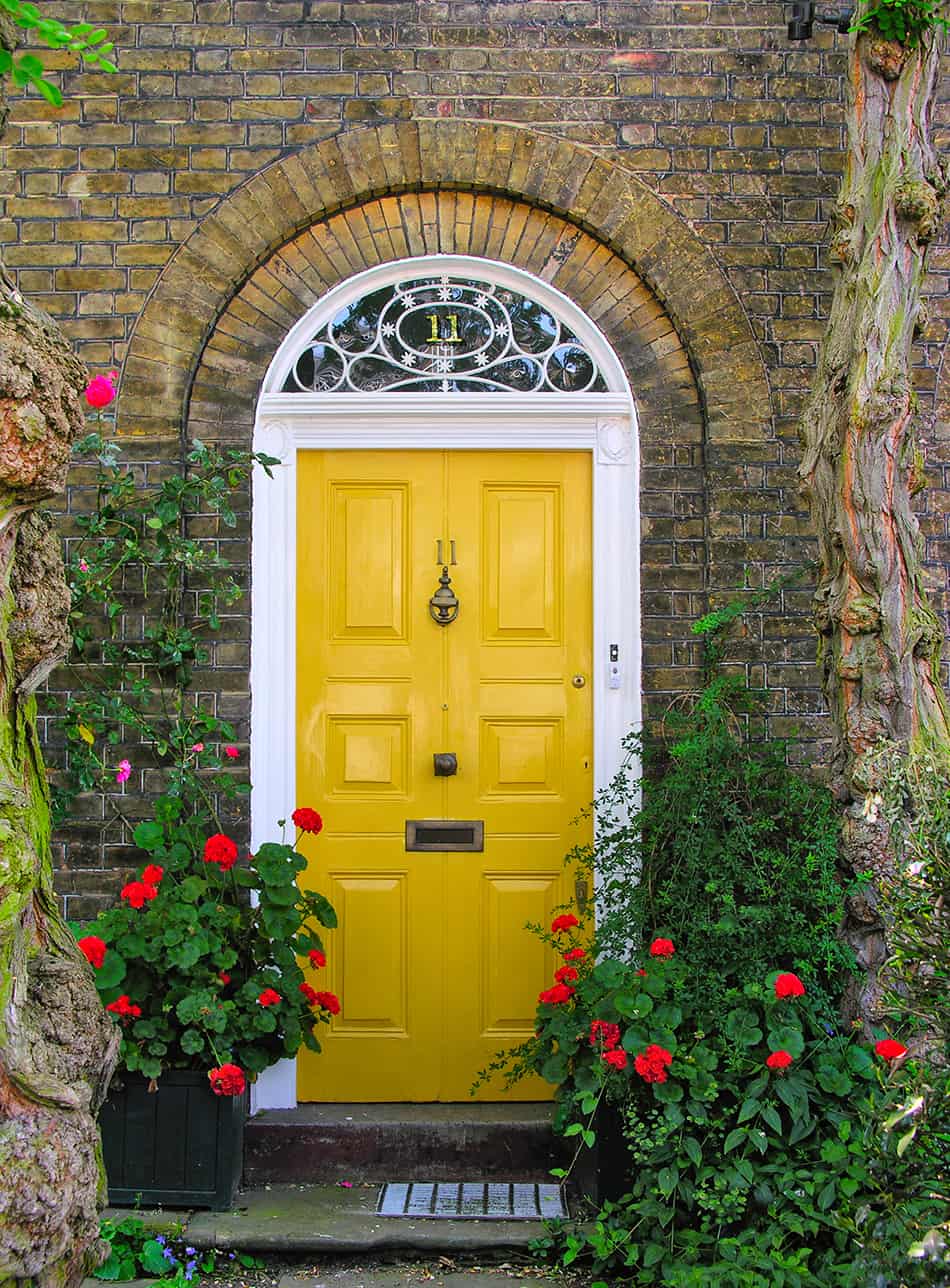 Yellow Door on a Dark Exterior