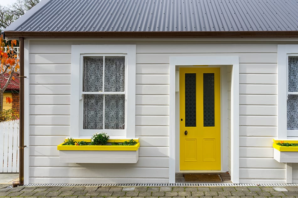 Yellow Door with White Siding