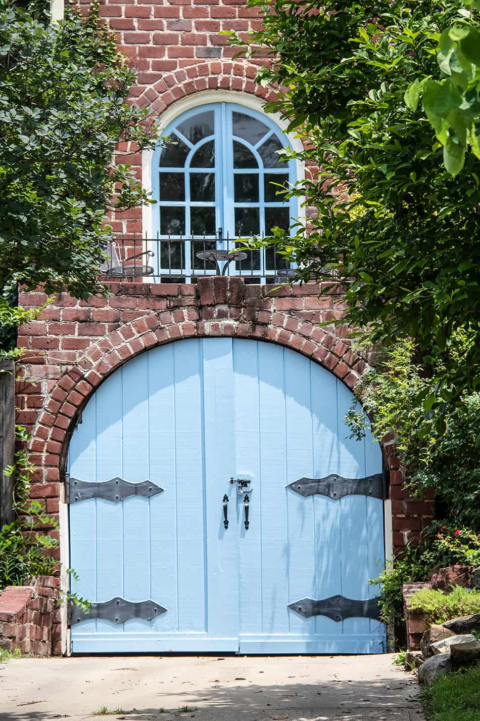 Arched Garage Door and Matching Window for Uniqueness