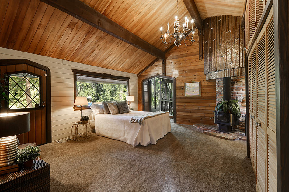 High-Vaulted Ceiling in a Rustic Bedroom