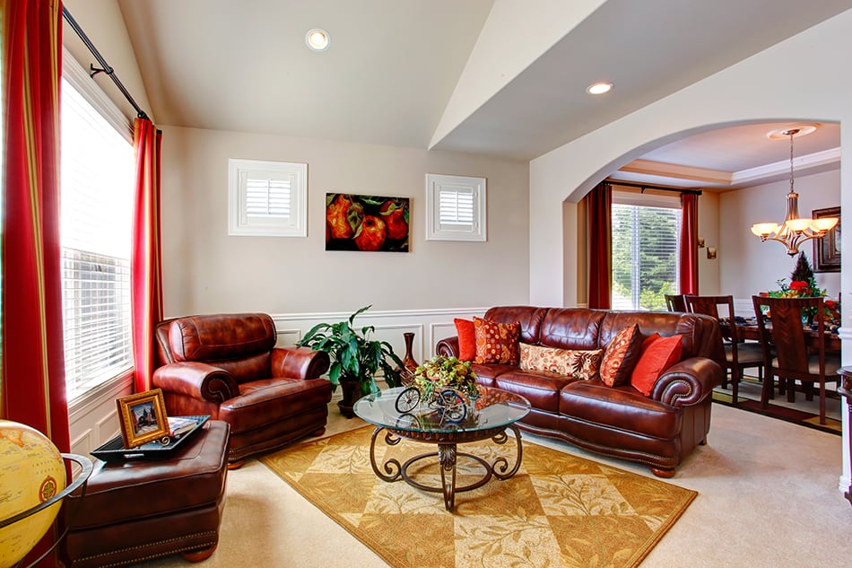 Beige Rug with Brown Leather Couch