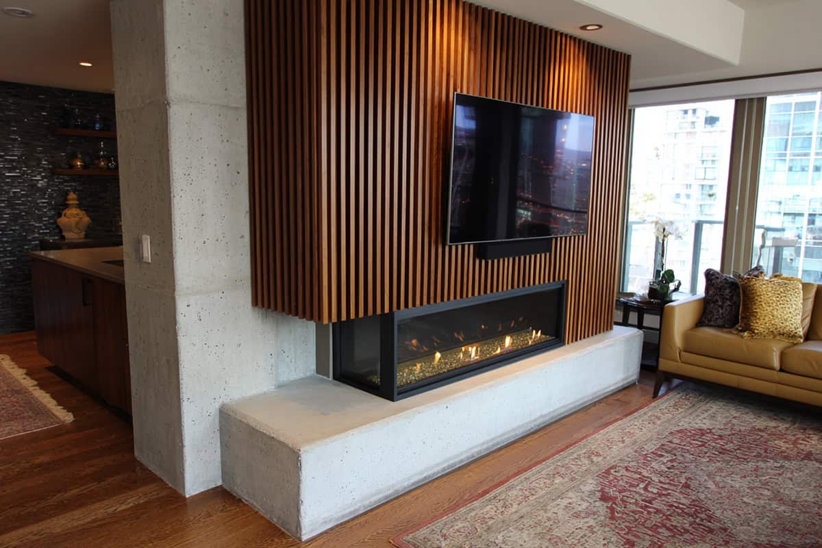 Fireplace with Slatted Wood Backdrop for the TV