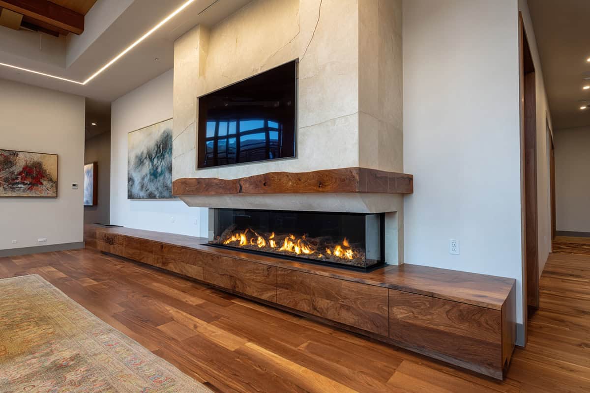 Mantel Spanning Between Fireplace and TV Cavity