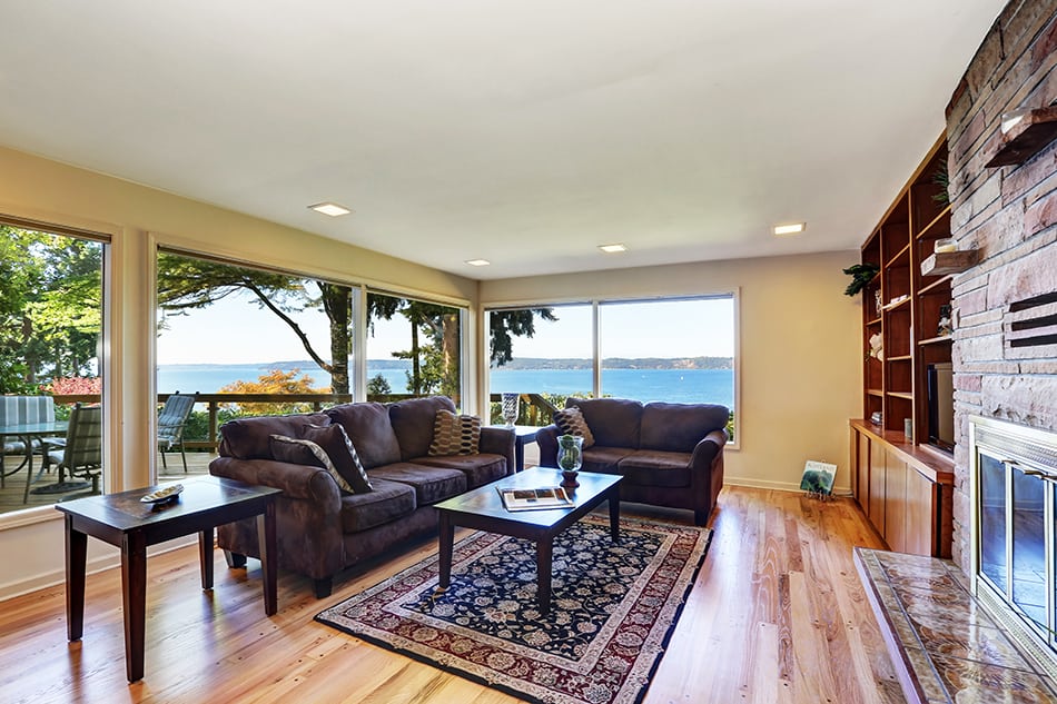 Red and Blue Persian Rug with Brown Couch