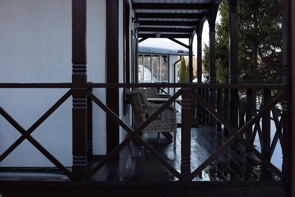 A Contemporary Home with X Shaped Porch Railings