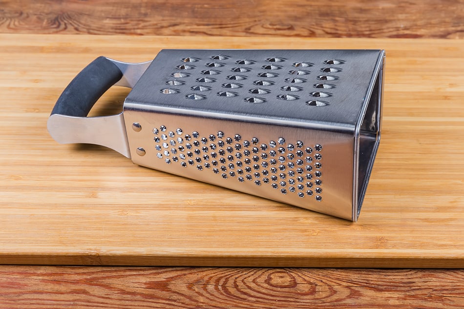Four-sided stainless steel grater