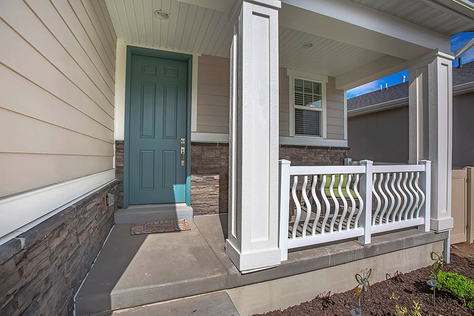 Modern-Looking Porch with White Arched Baluster Railings