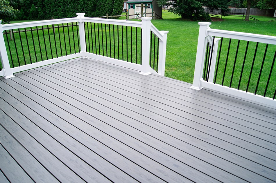 Spacious Porch Framed with Traditional Straight Post Railings