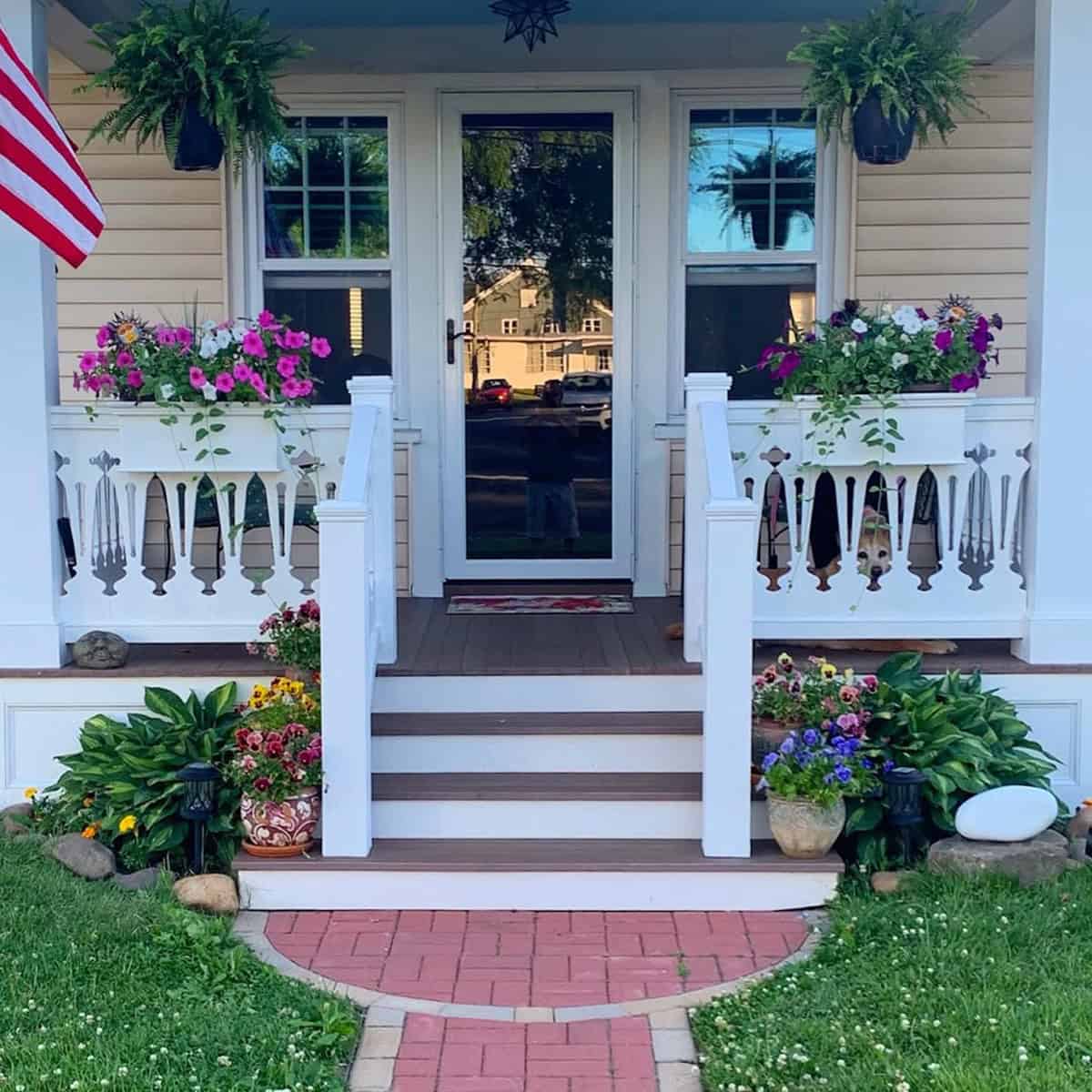 Whimsical White Porch Railing with Cutout Designs