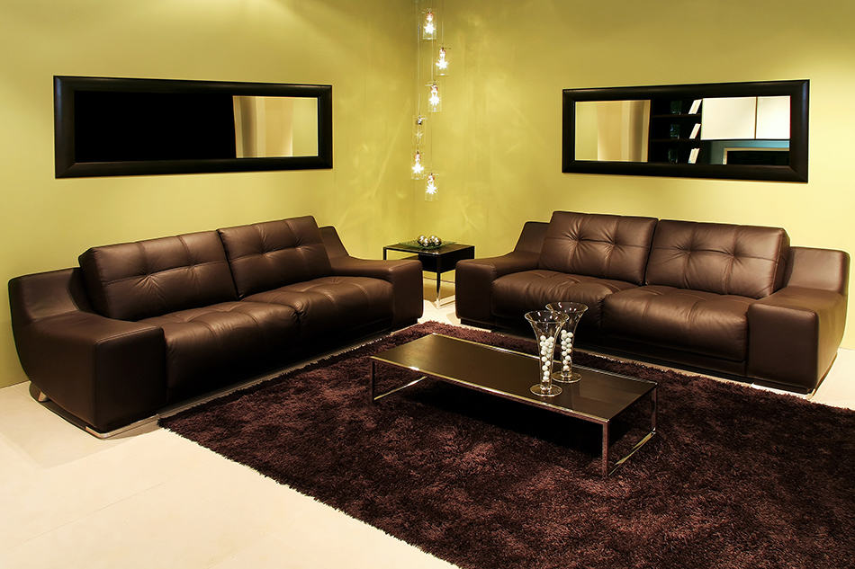 A Brown Rug to Frame the Brown Leather Sofas
