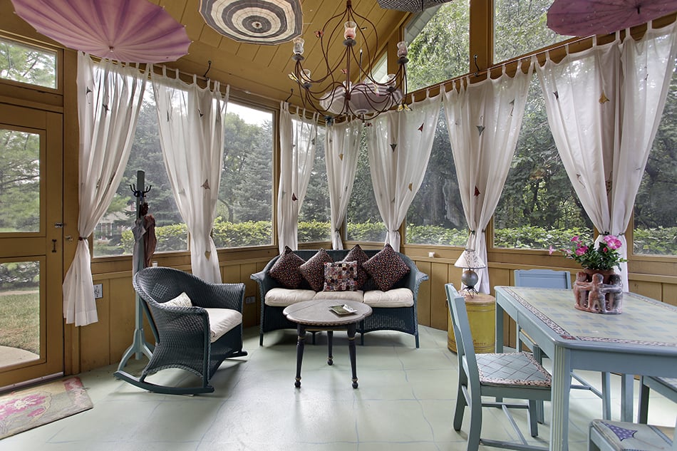 Intimate Porch with Wide Window and Sheer Curtains