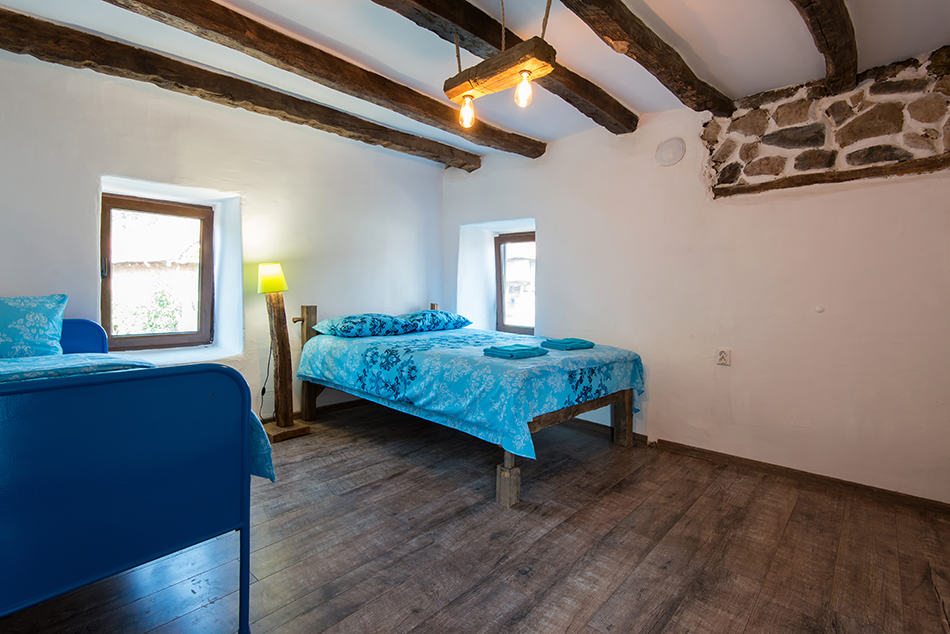 Statement Beams in a Country Style Bedroom