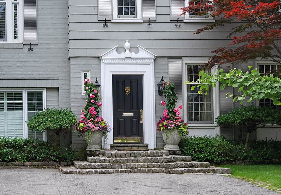 Black Door with Gray Shutters