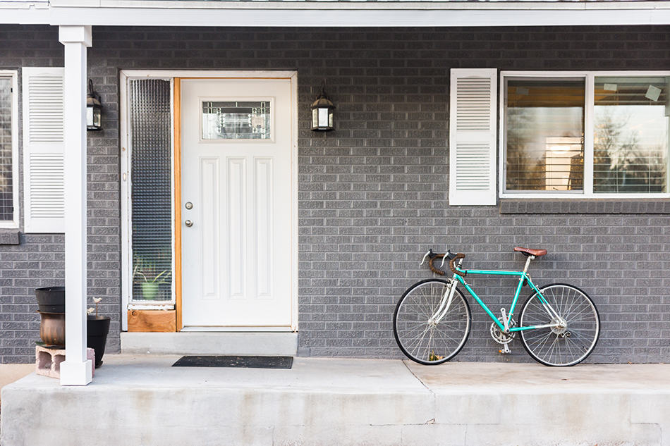 Bright White Front Door and Gray House