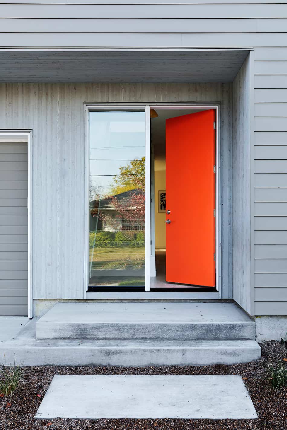 Pumpkin Orange Front Door and Gray House