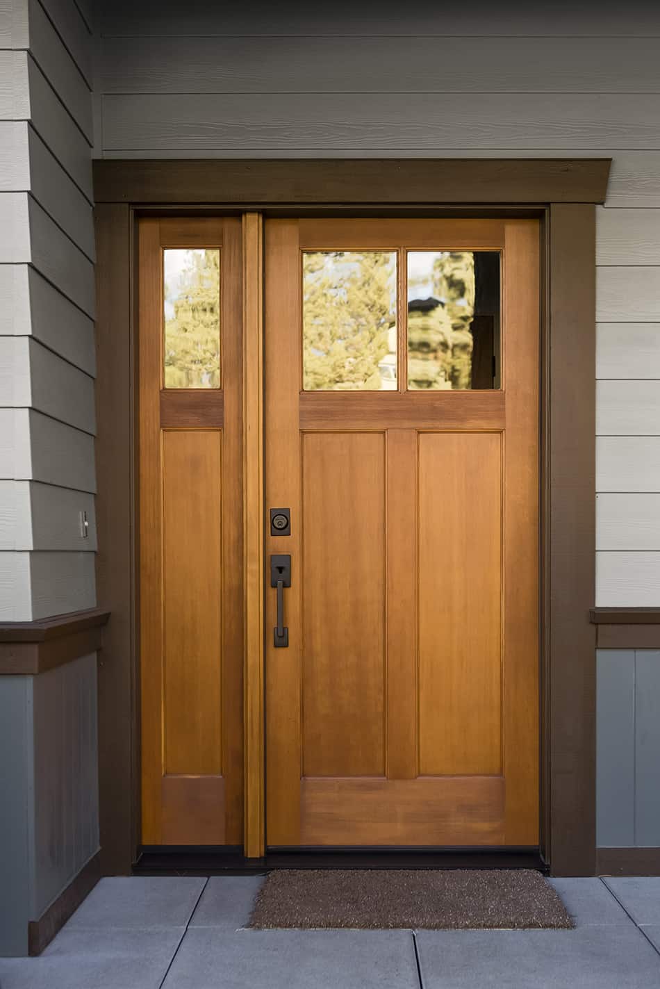 Woody Brown Front Door and Gray House