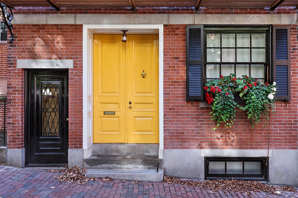 Yellow Door with Black Shutters