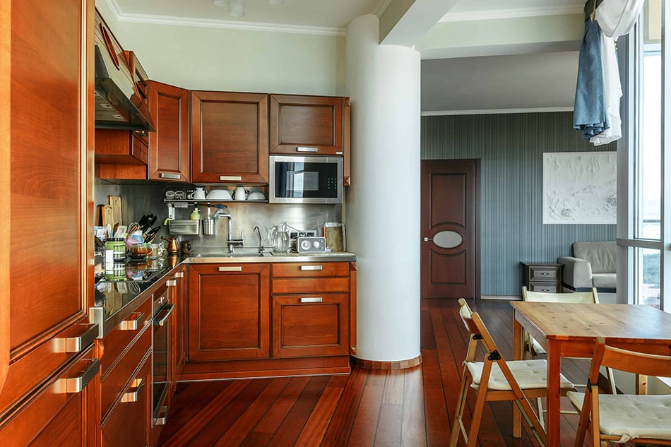 Dark maple or pale mahogany cabinets