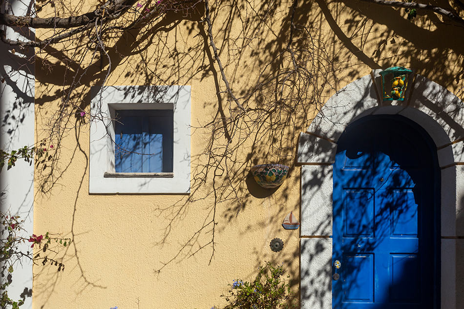 Bright Blue Front Door and Tan House