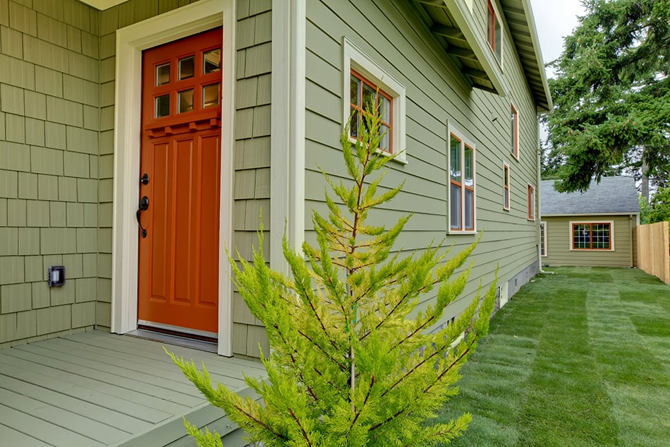 Burnt Orange with Warm Green Siding