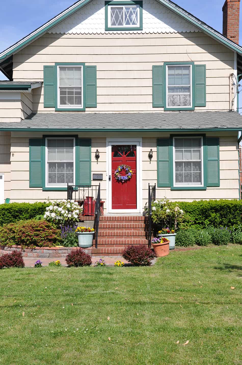 Energetic Red Front Door and Tan House