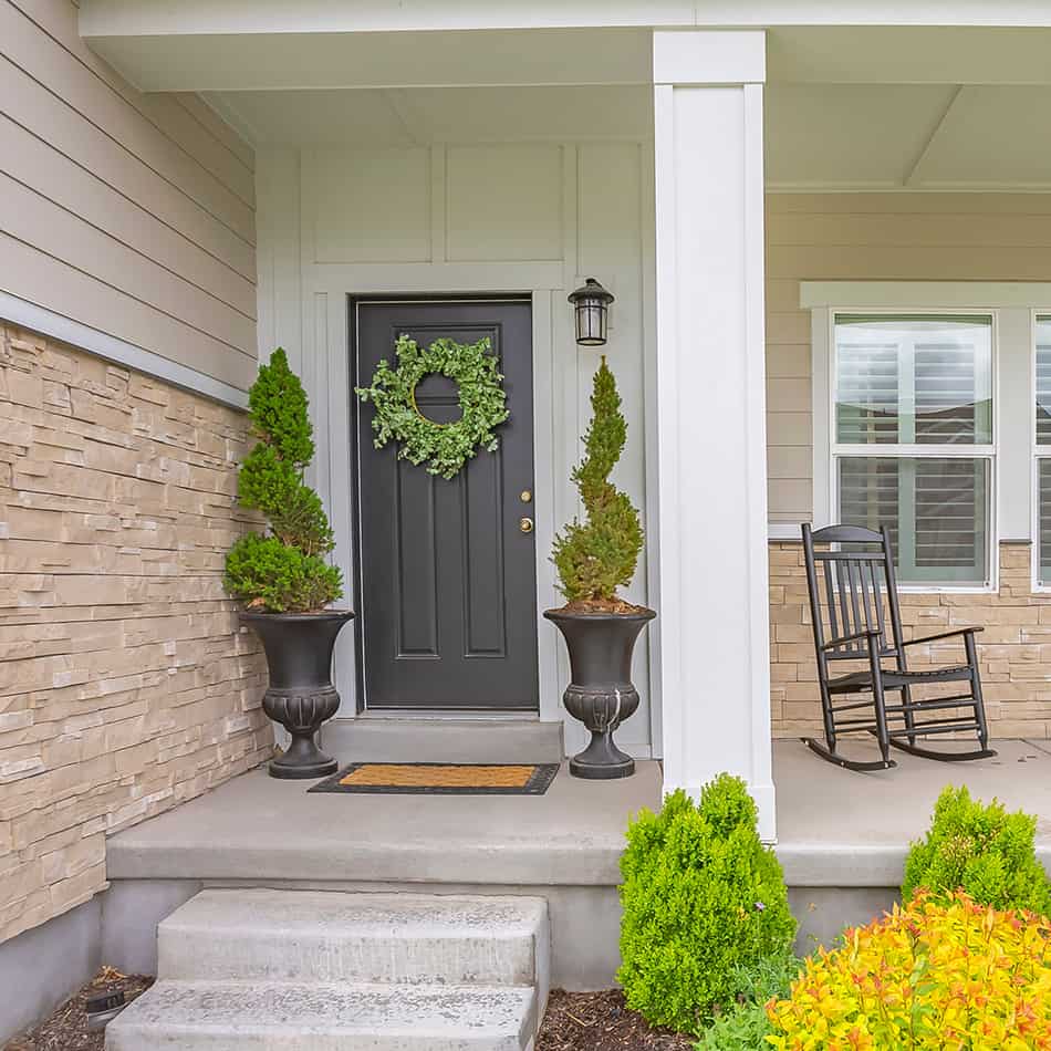 Gracious Gray Front Door and Tan House