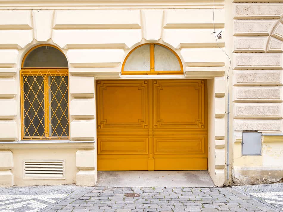 Warm Yellow Front Door and Tan House