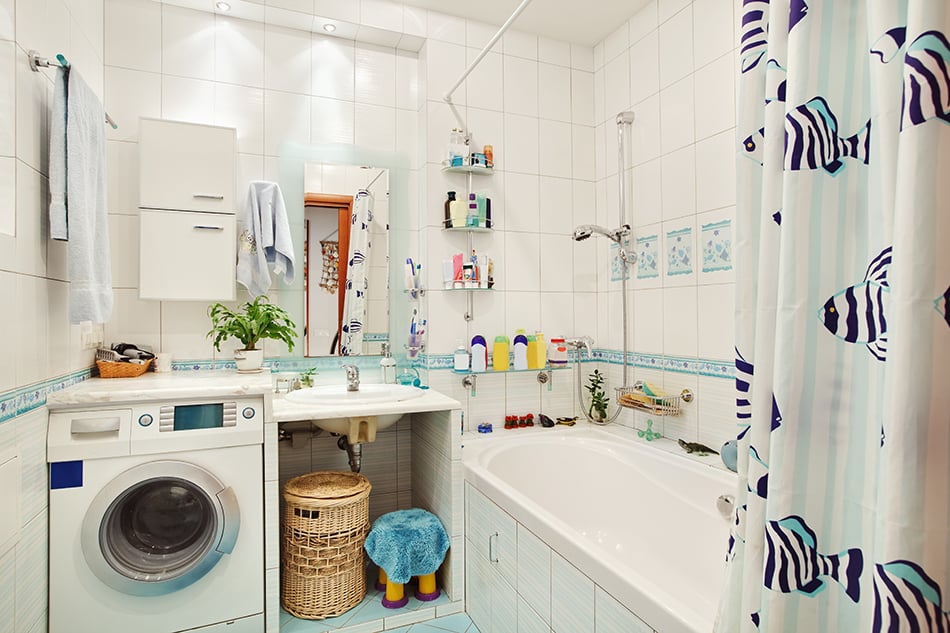 White Bathroom with Bathtub, Shower, and Washing Machine