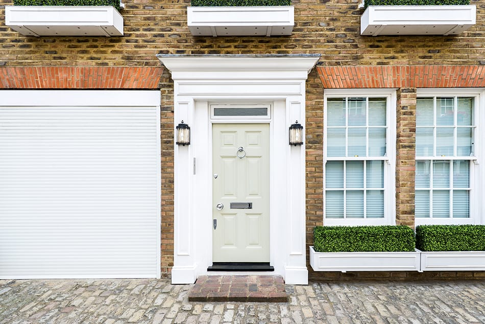 White Door on Brown Brick Exterior