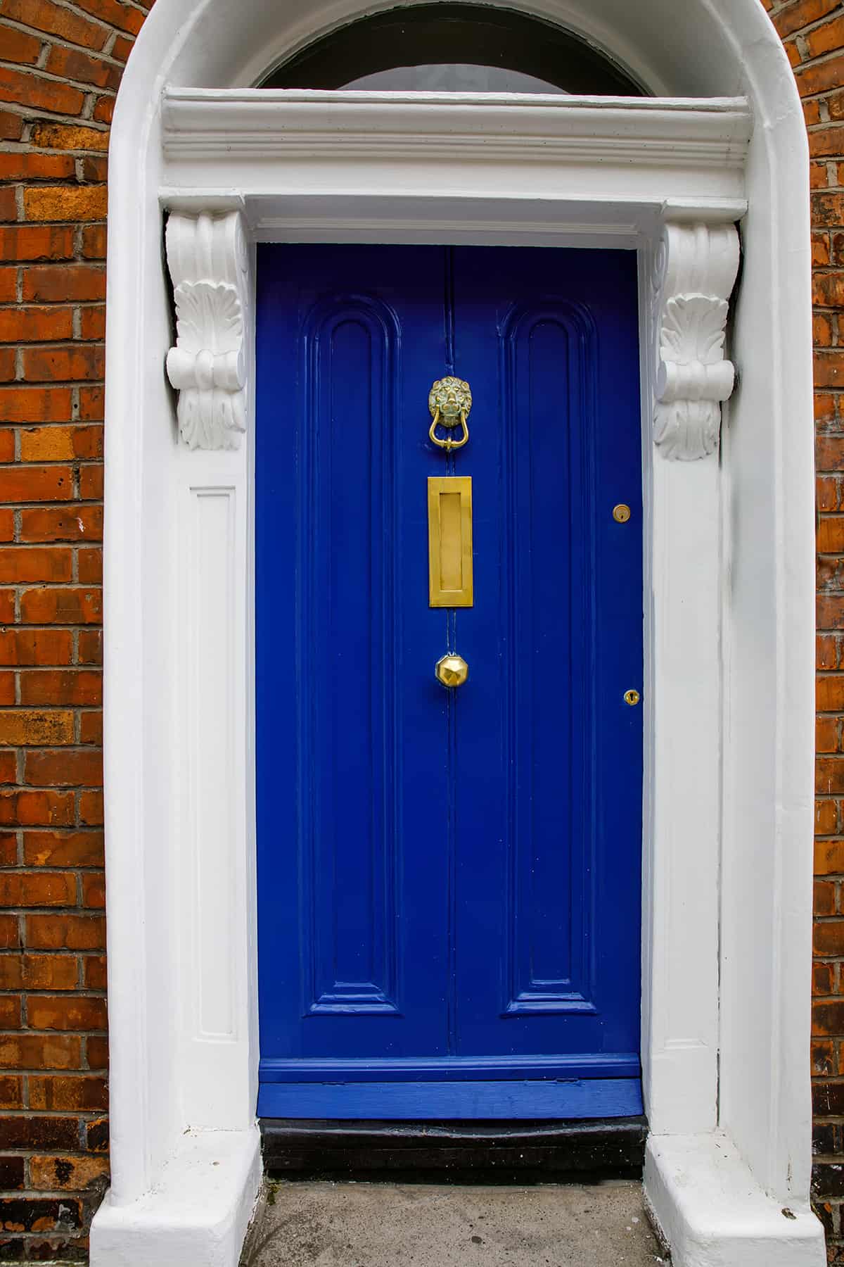 Cobalt Blue Front Door and Red Brick House