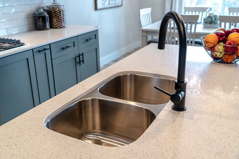 installing kitchen sink under granite