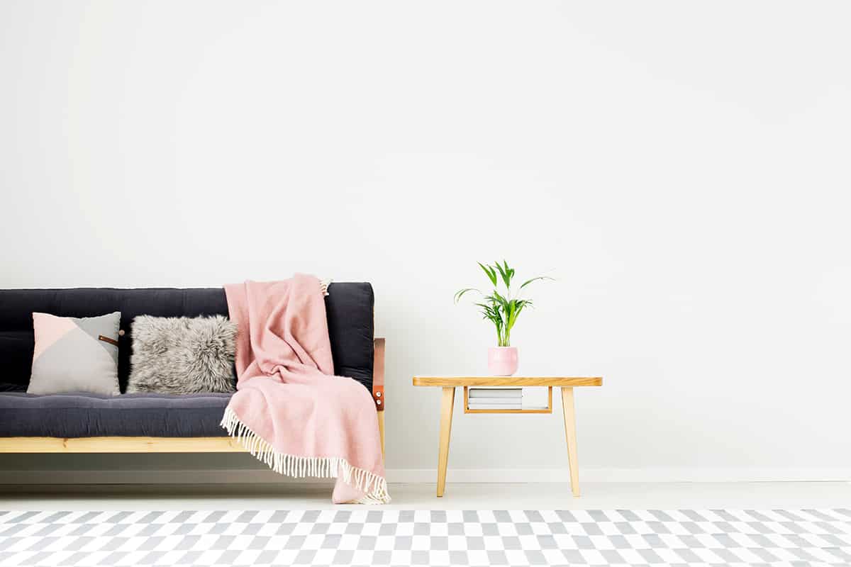 Accent Your Charcoal Grey Couch with Soft Pink