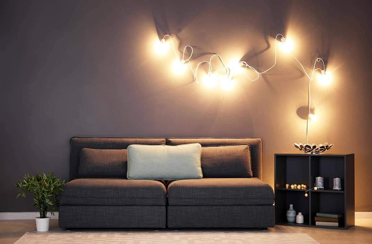 Warm Up the Charcoal Interior With Soft Lighting
