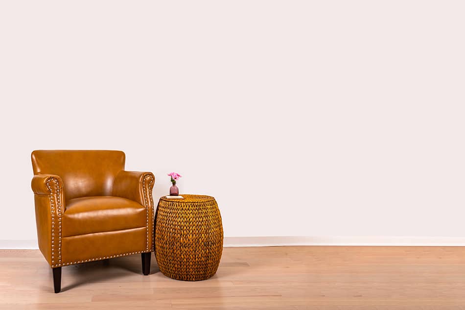 Neutral Styles with brown armchair coffee table and light hardwood floor