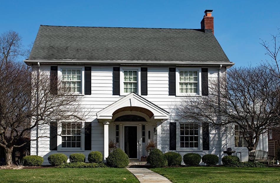 White house with a black roof